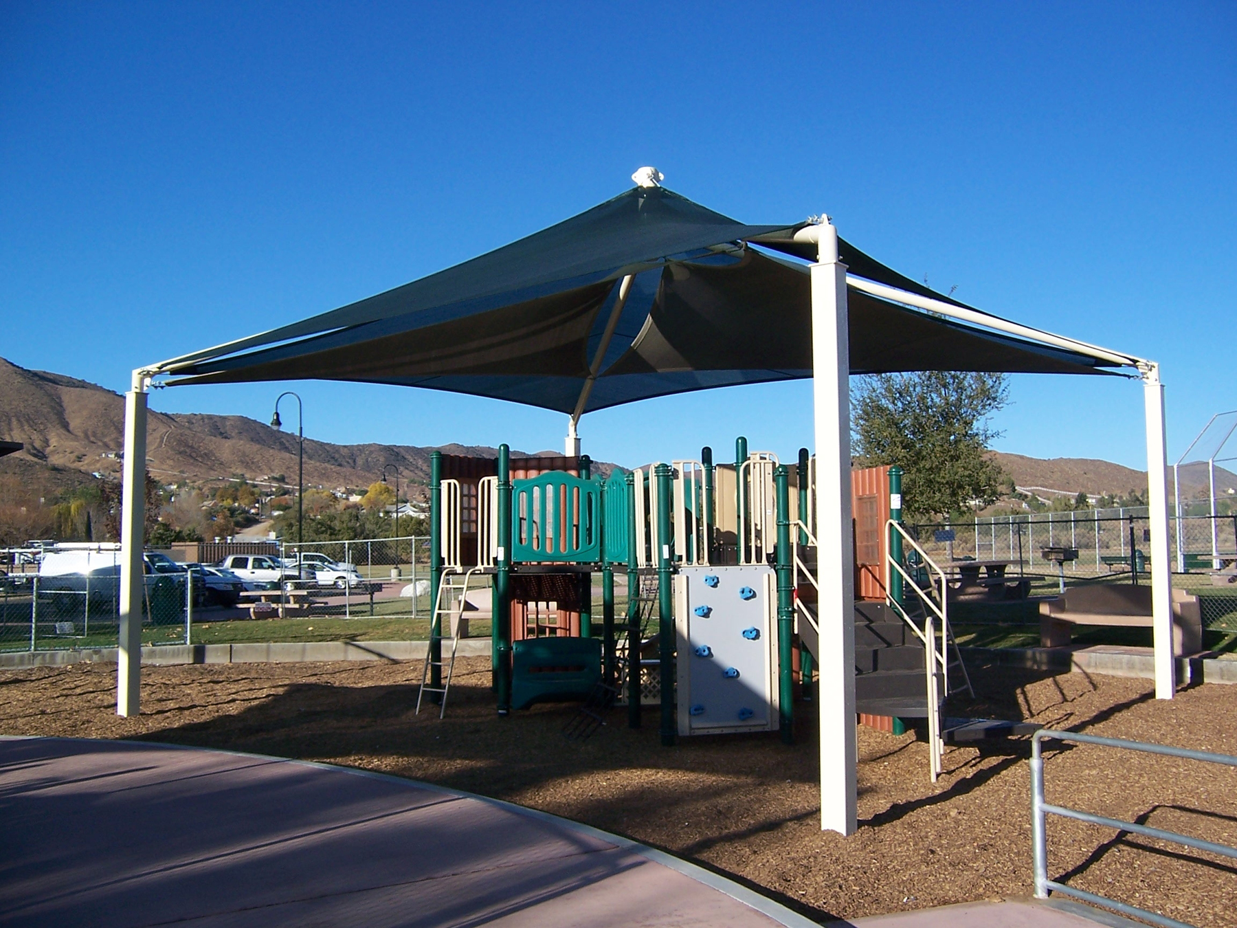 playground with sun shade on sunny day