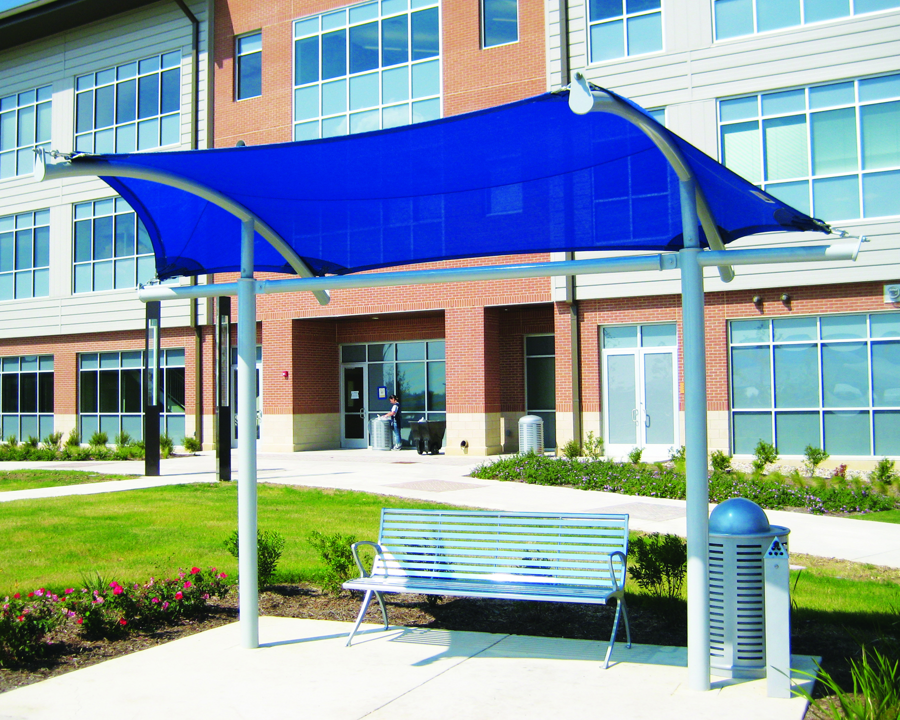 blue shade covering outdoor bench