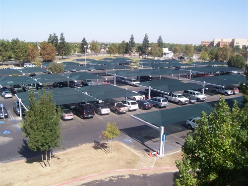 green shades covering parking lot