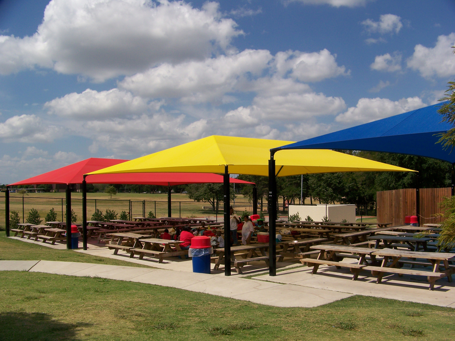 shade structures over picnic tables