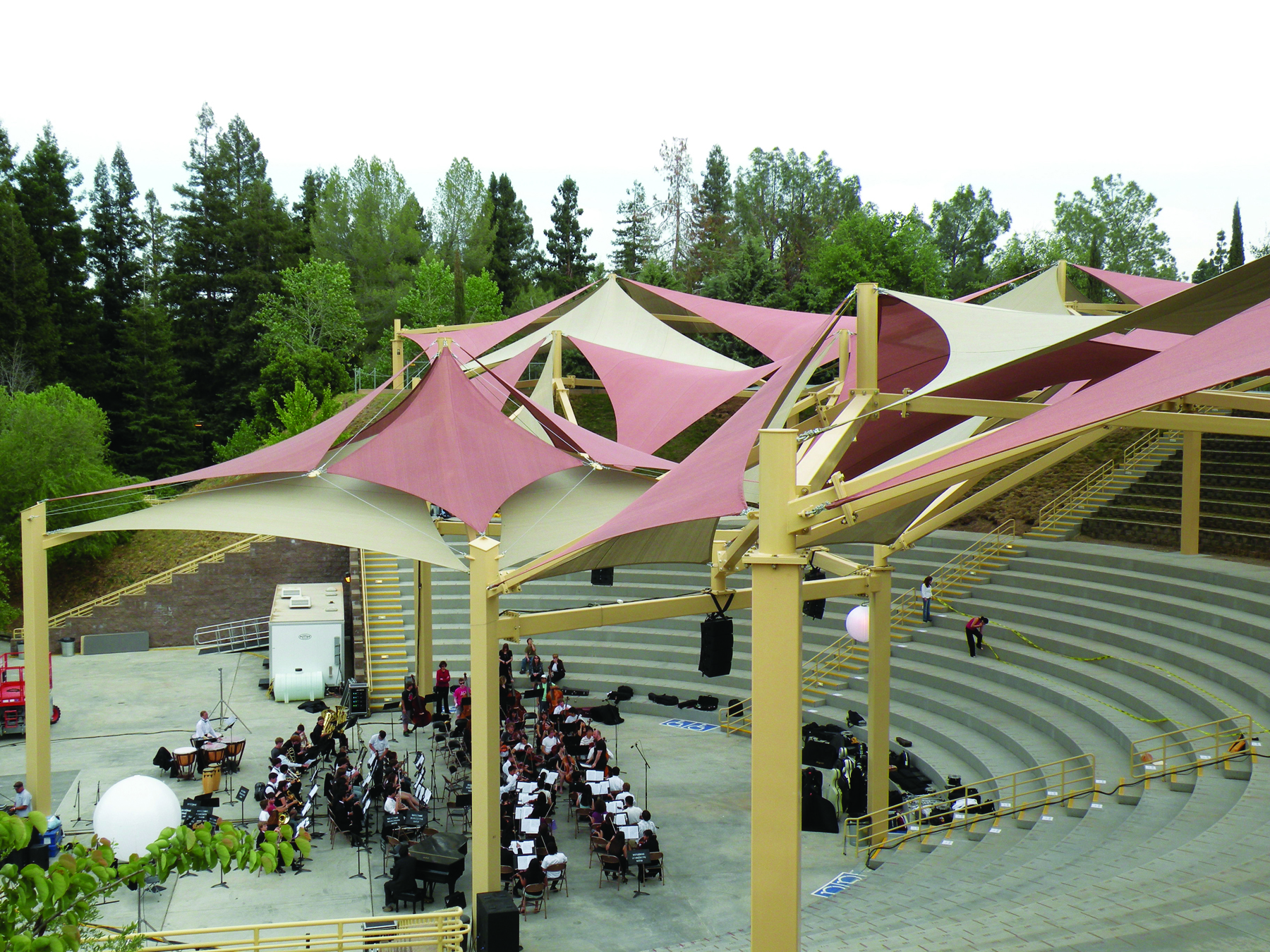 orchestra playing underneath shades