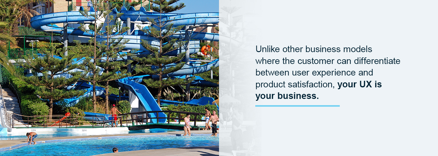 A blue water slide at a water park.