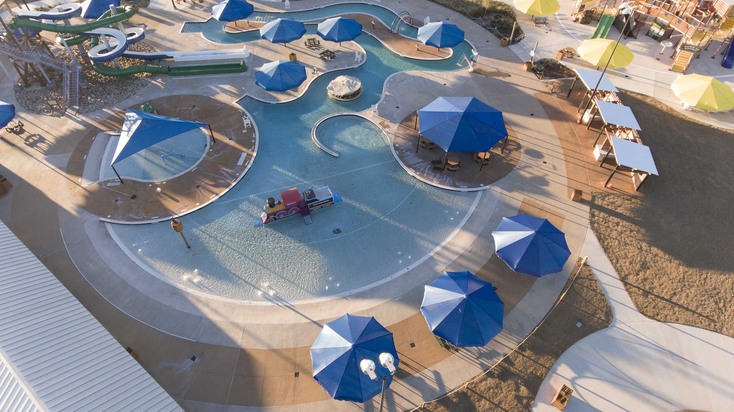 multiple usa shades around outdoor pool area