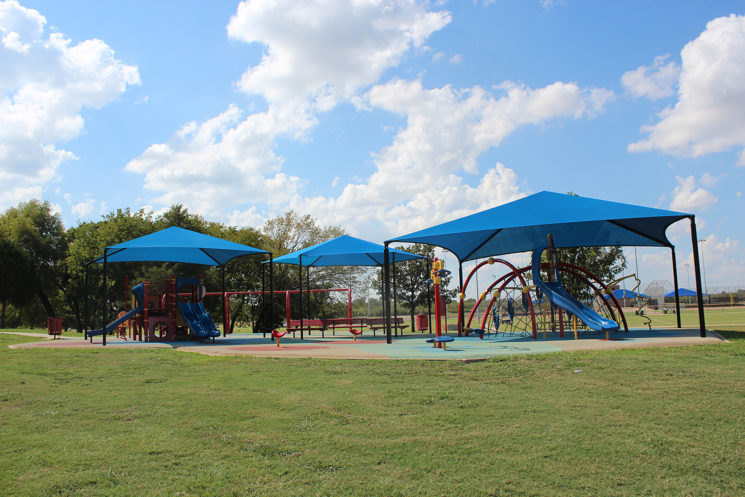 multiple usa shades covering playground equipment