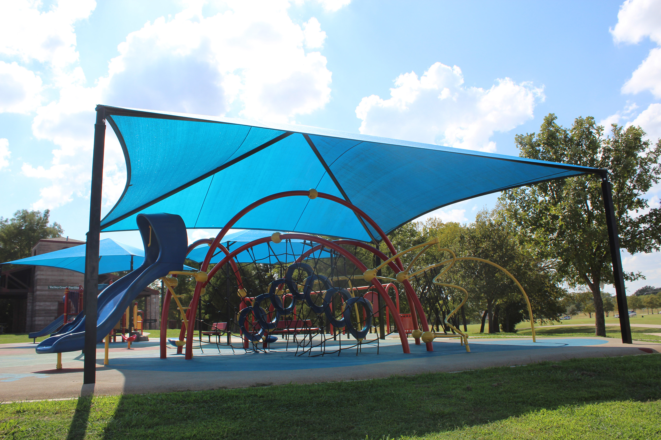 blue sun shade covering playground