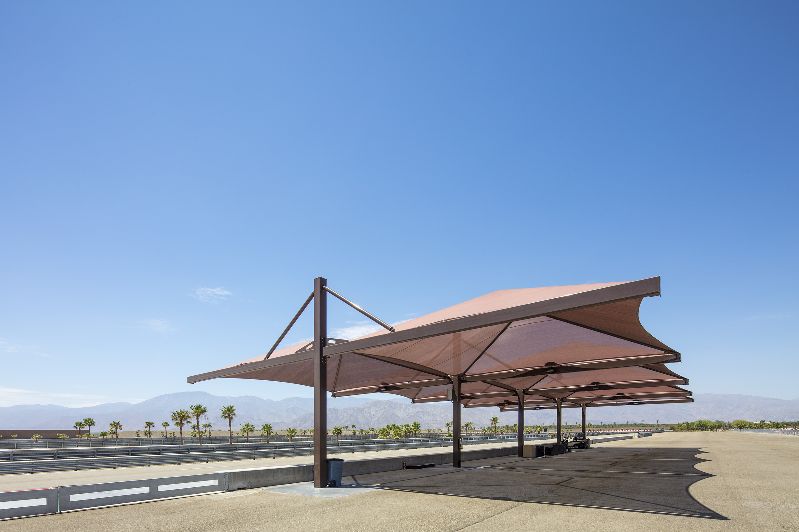 usa shades covering outdoor parking spaces