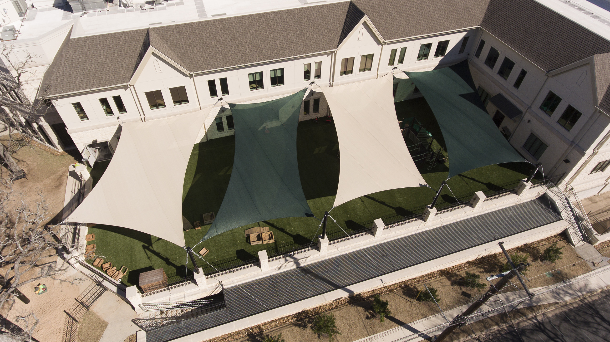 top view of usa shades utilized in church court yard