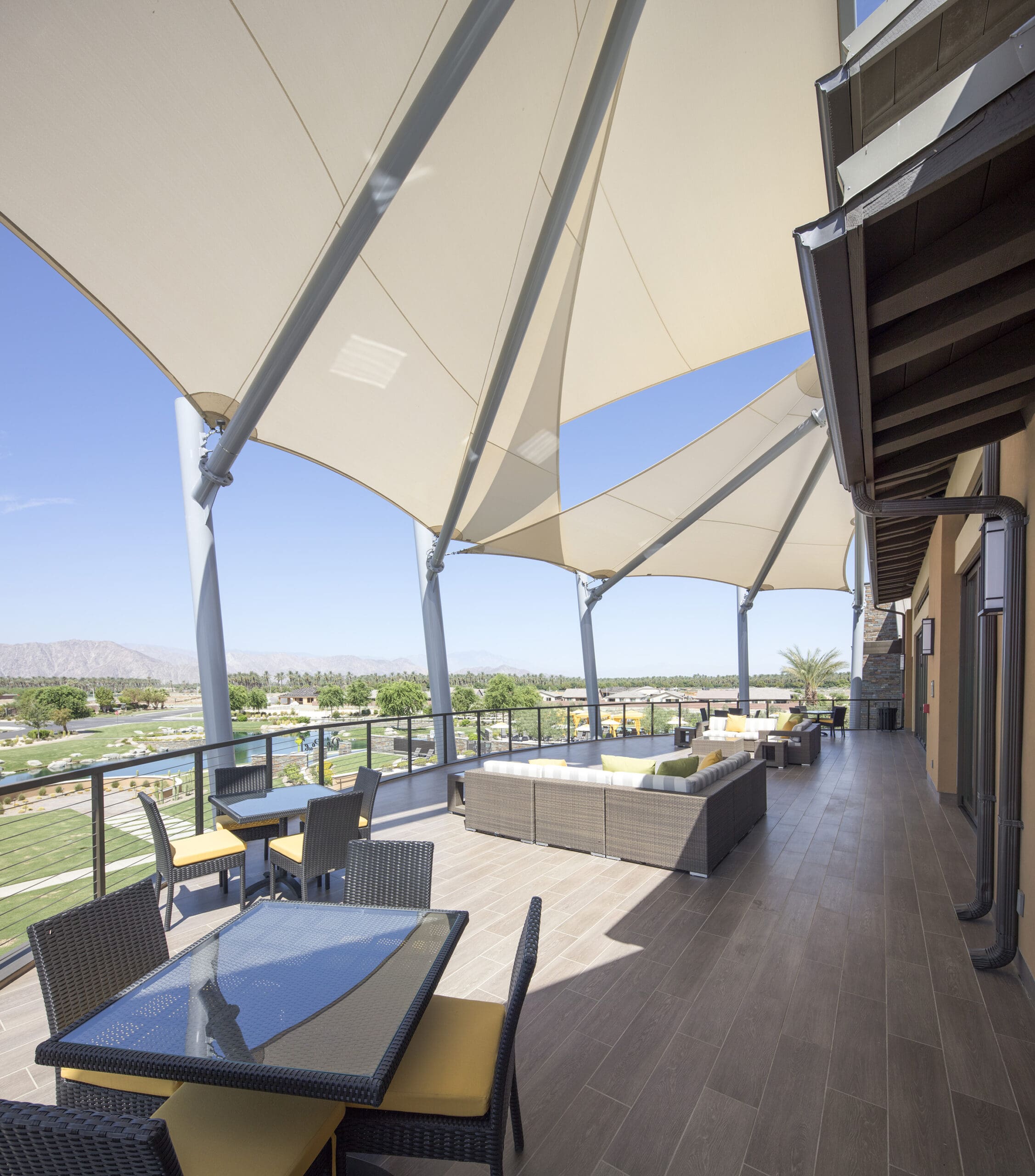 large white usa shade covering outdoor patio