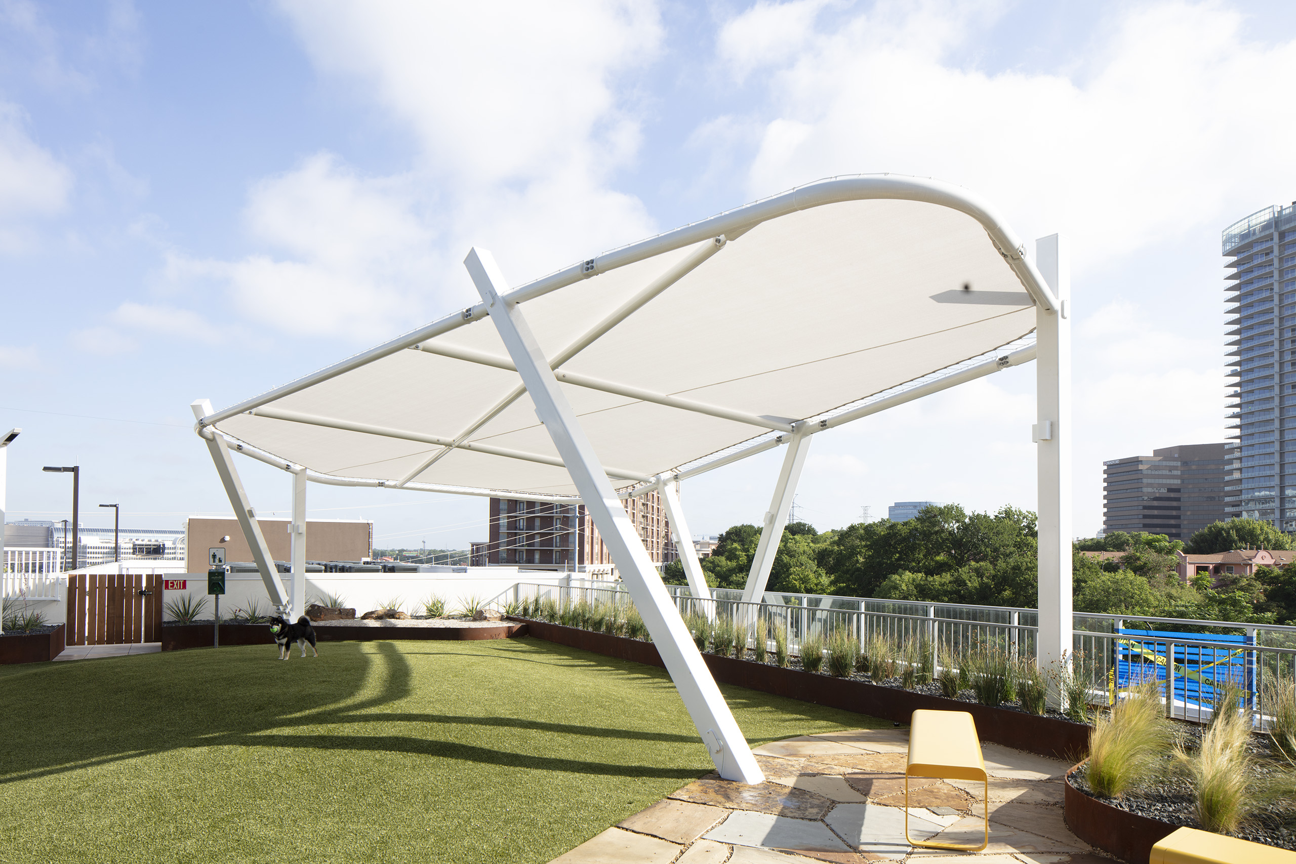 shade structure on roof protecting katy station dog park