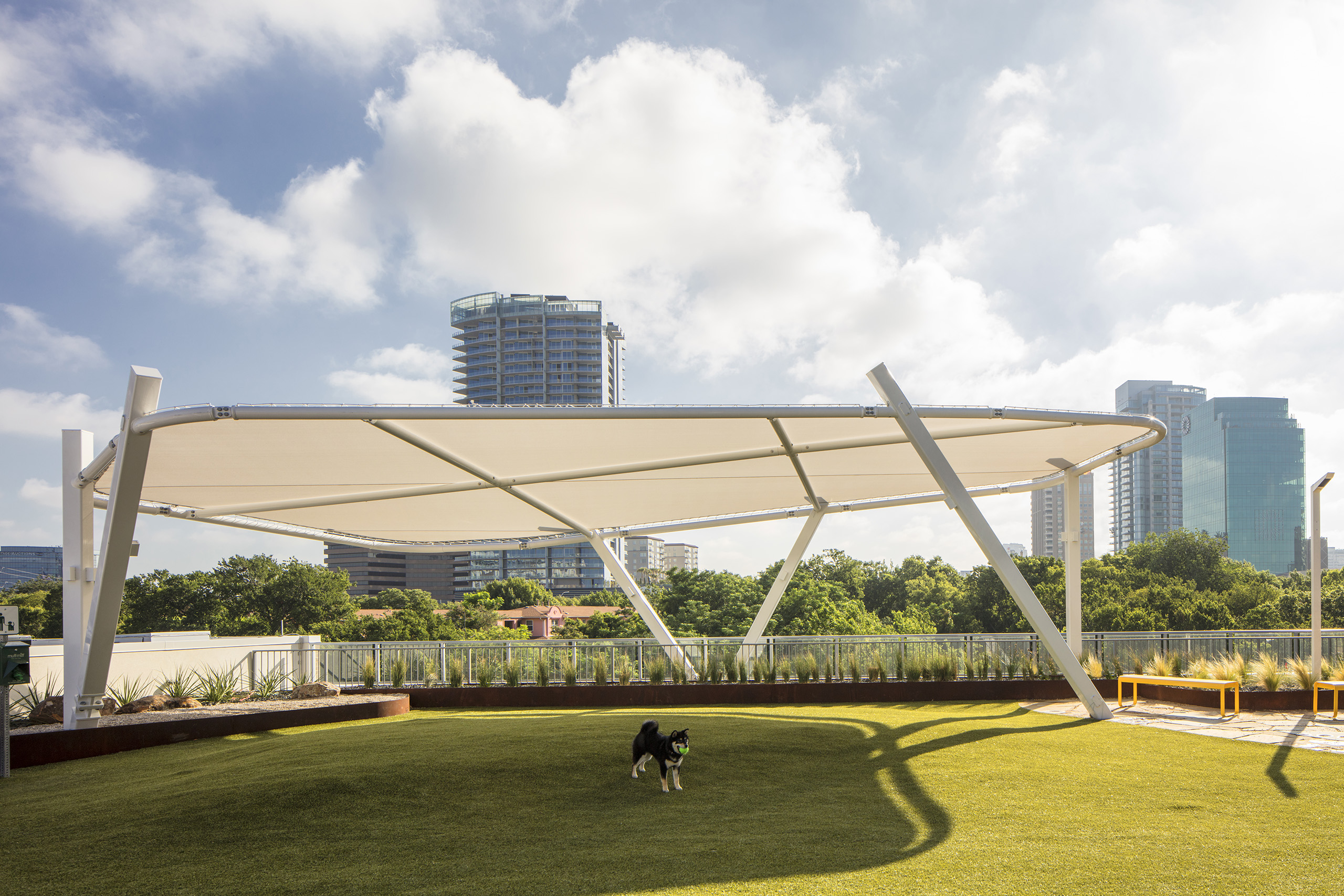 shade structure on roof for dog park at katy station