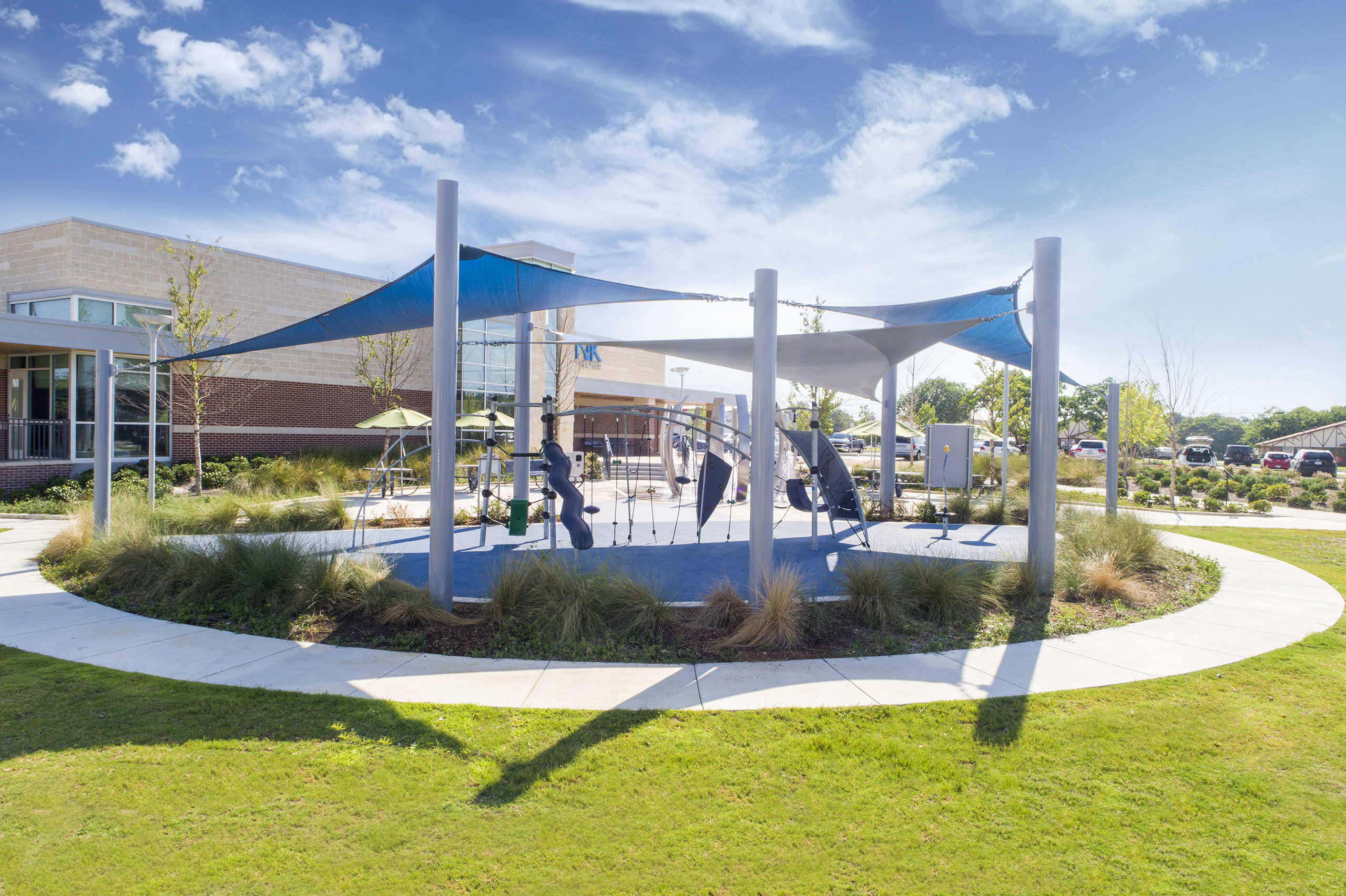outdoor playground covered by triangle shades