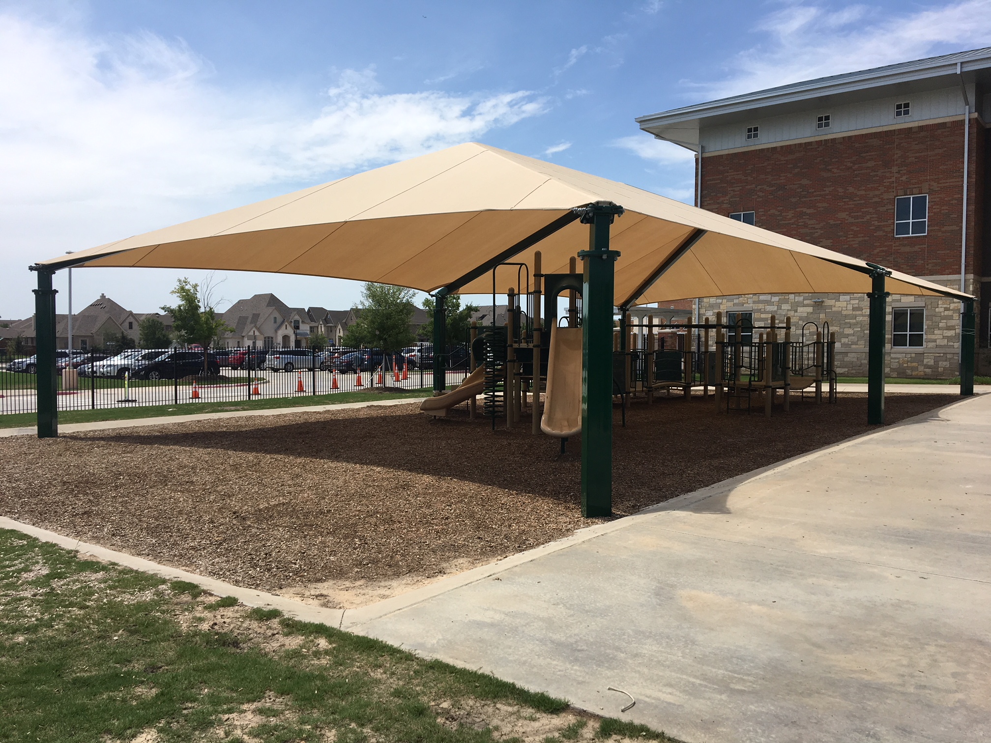 outdoor school playground covered by usa shade