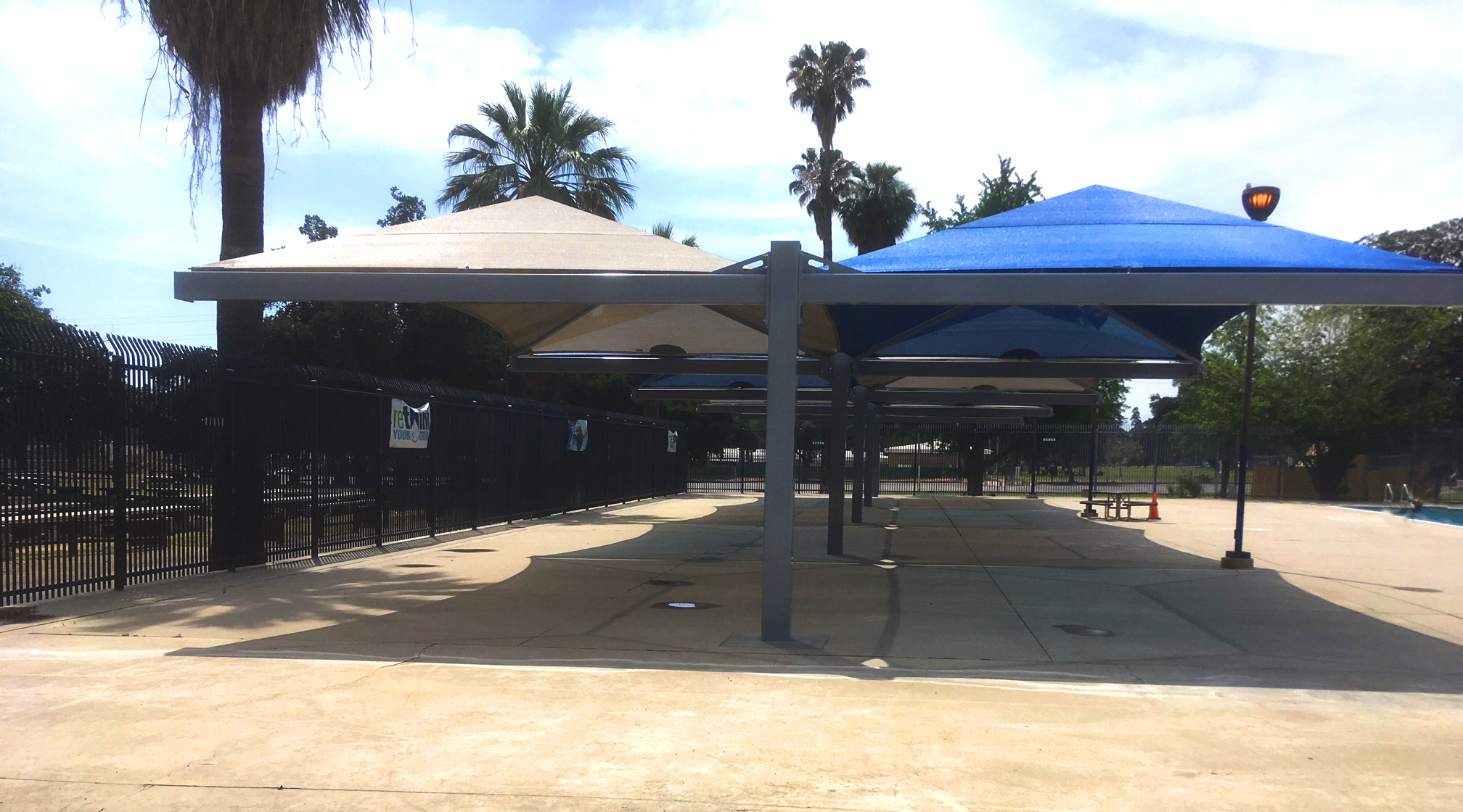 tan and blue shade structure