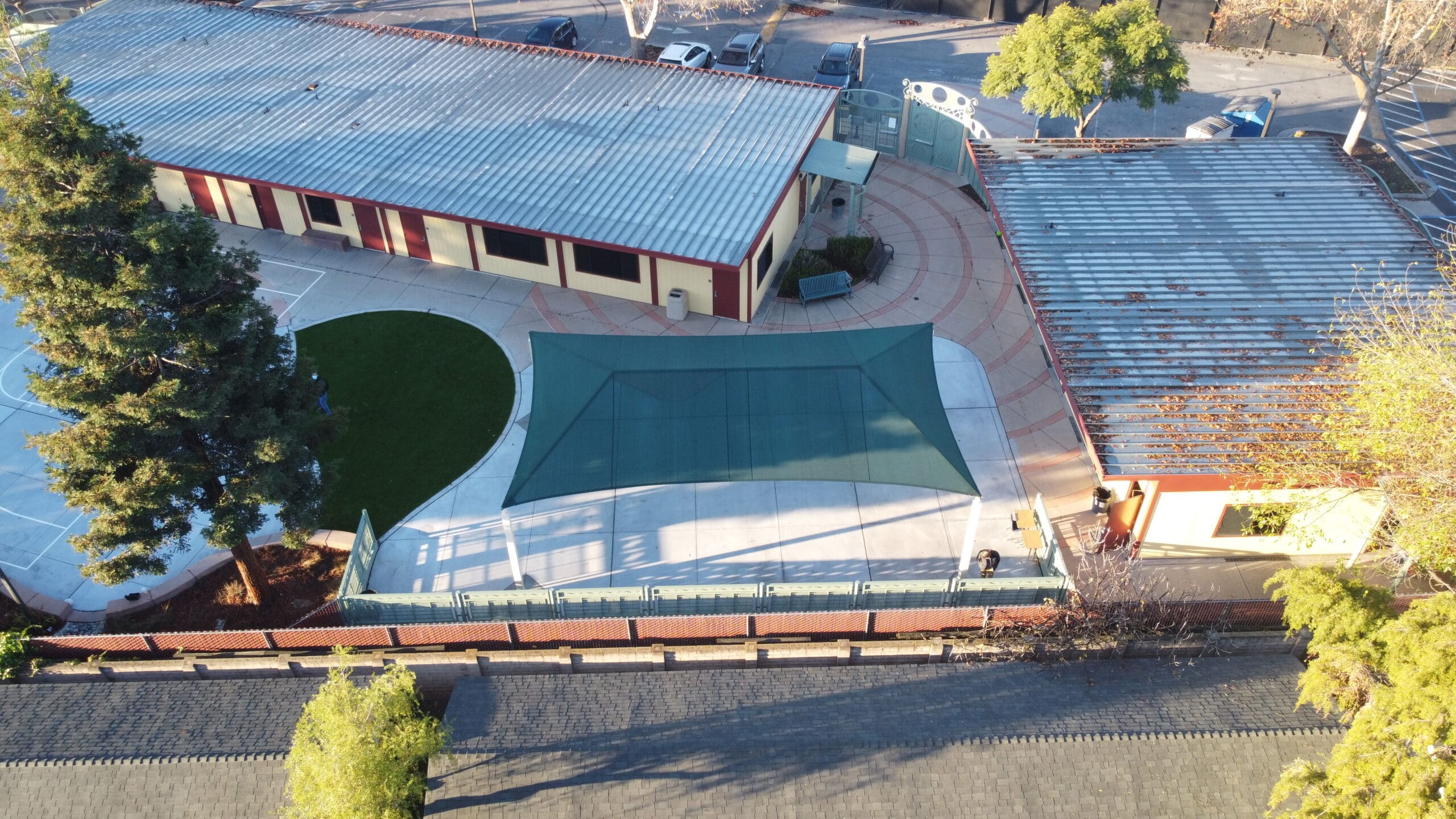 top view of high school with usa shade structure