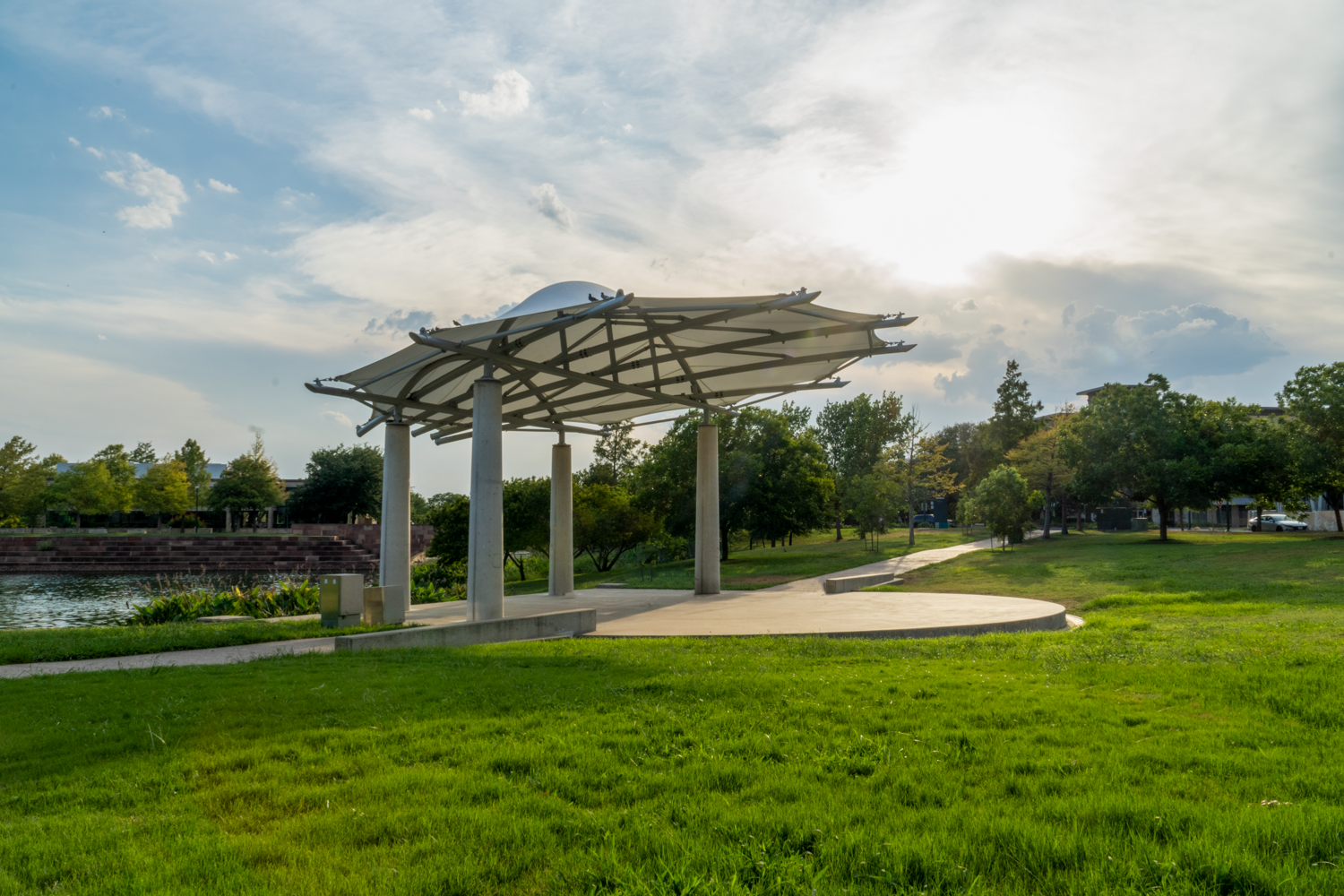 large sun shade covering amphitheater in park