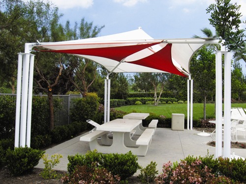 picnic tables under usa shade structure