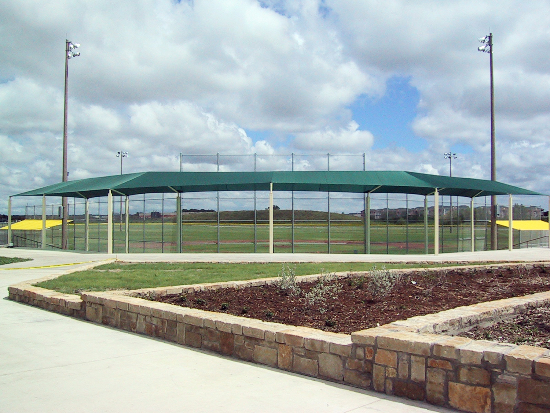 green usa shade surrounding baseball field