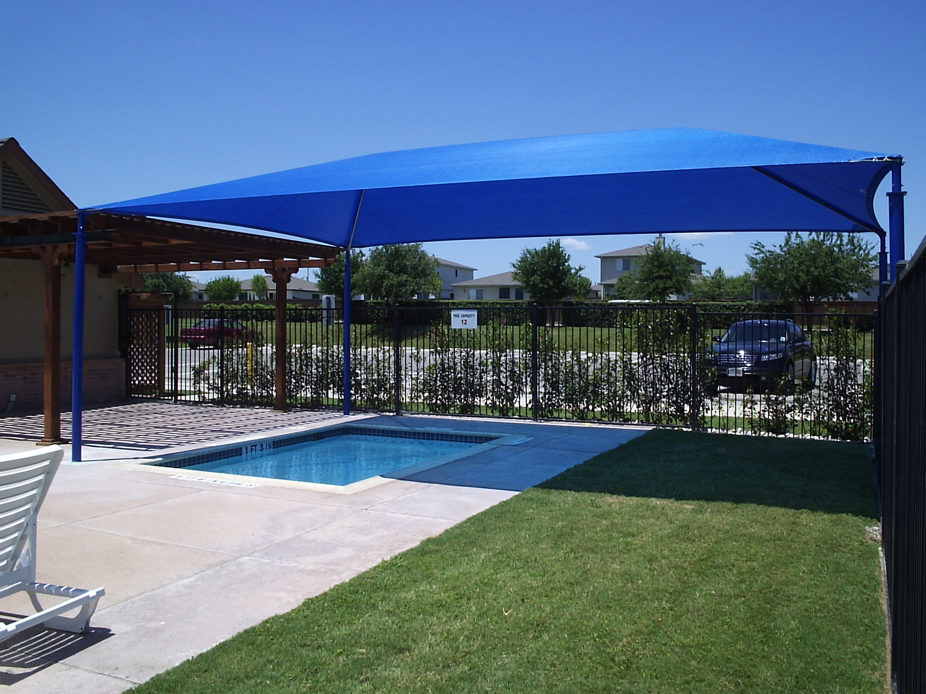 blue shade covering outdoor pool