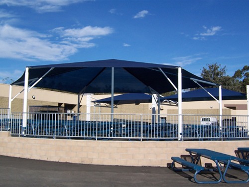 blue hexagon usa shade over outdoor seats
