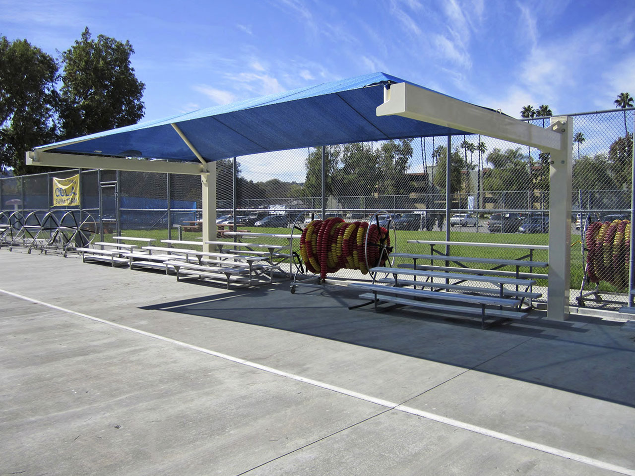 blue usa shades covering outdoor bleachers
