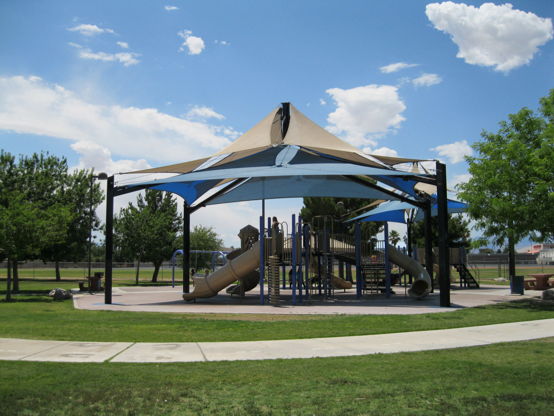 large sun shade covering outdoor playground