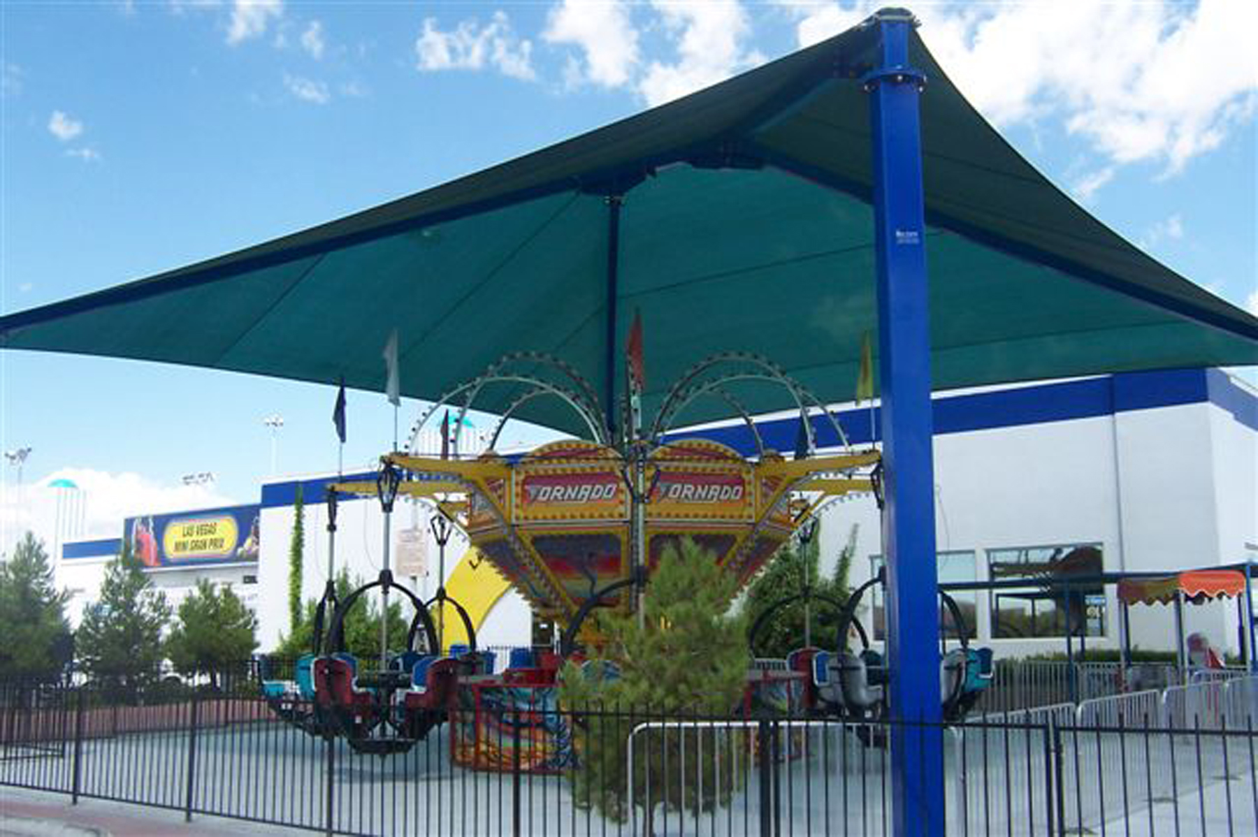 large shade covering carnival ride