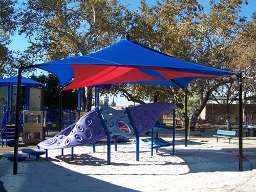 blue and red shade structure at recreational playground area