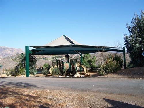 large shade covering playground equipment