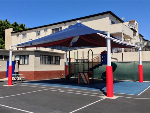Shade structure over playground at catholic school