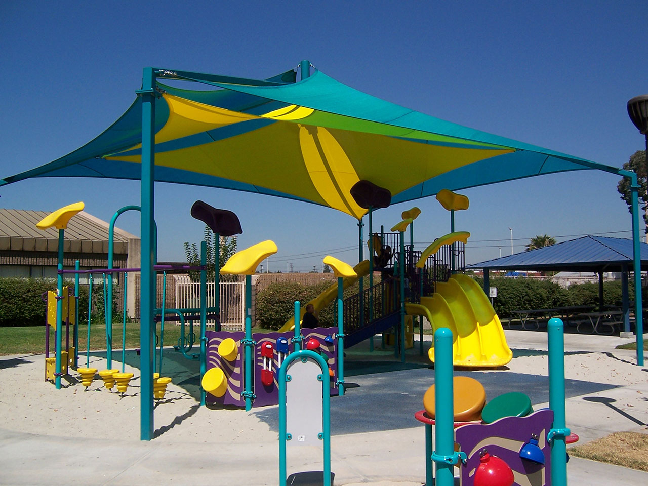 colorful playground shade structure at playground