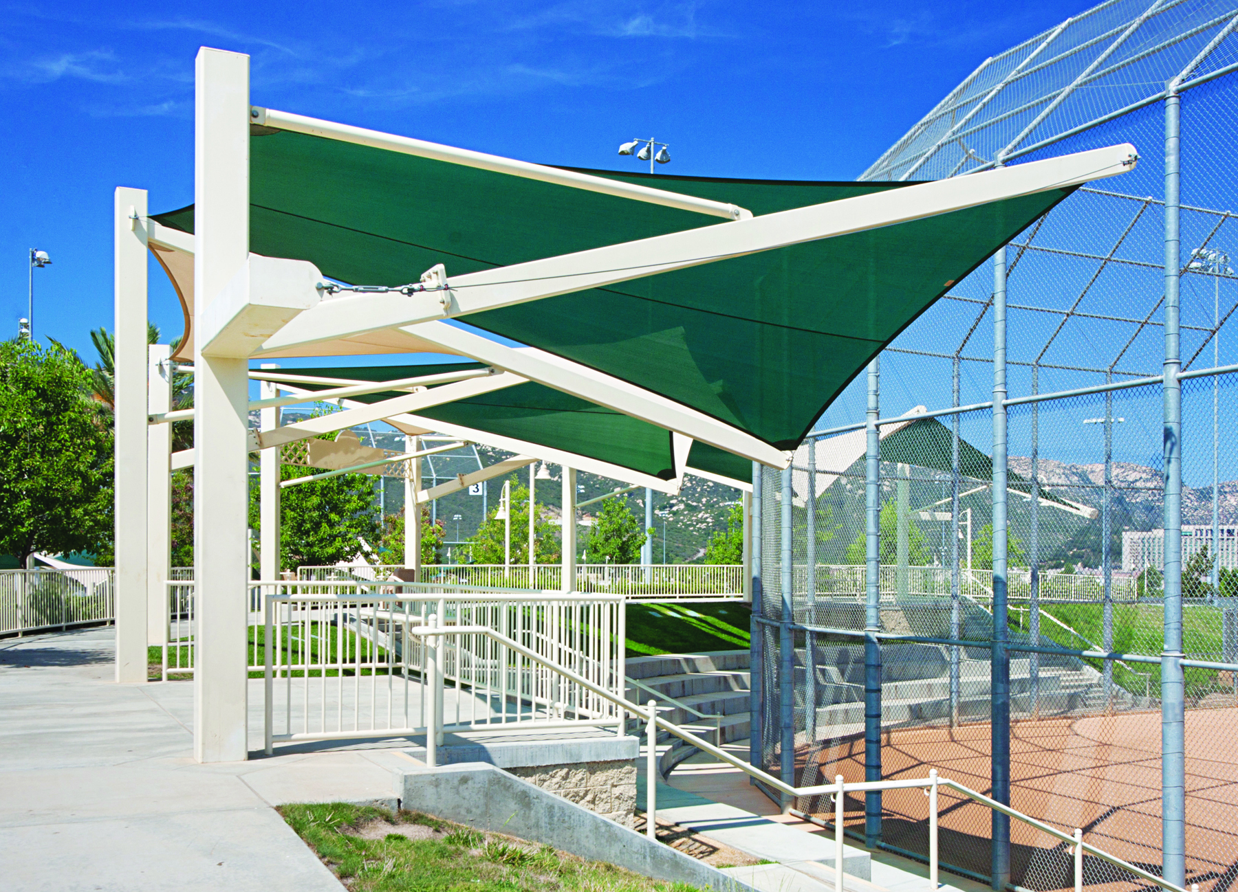 outdoor baseball field bleachers covered by usa shades