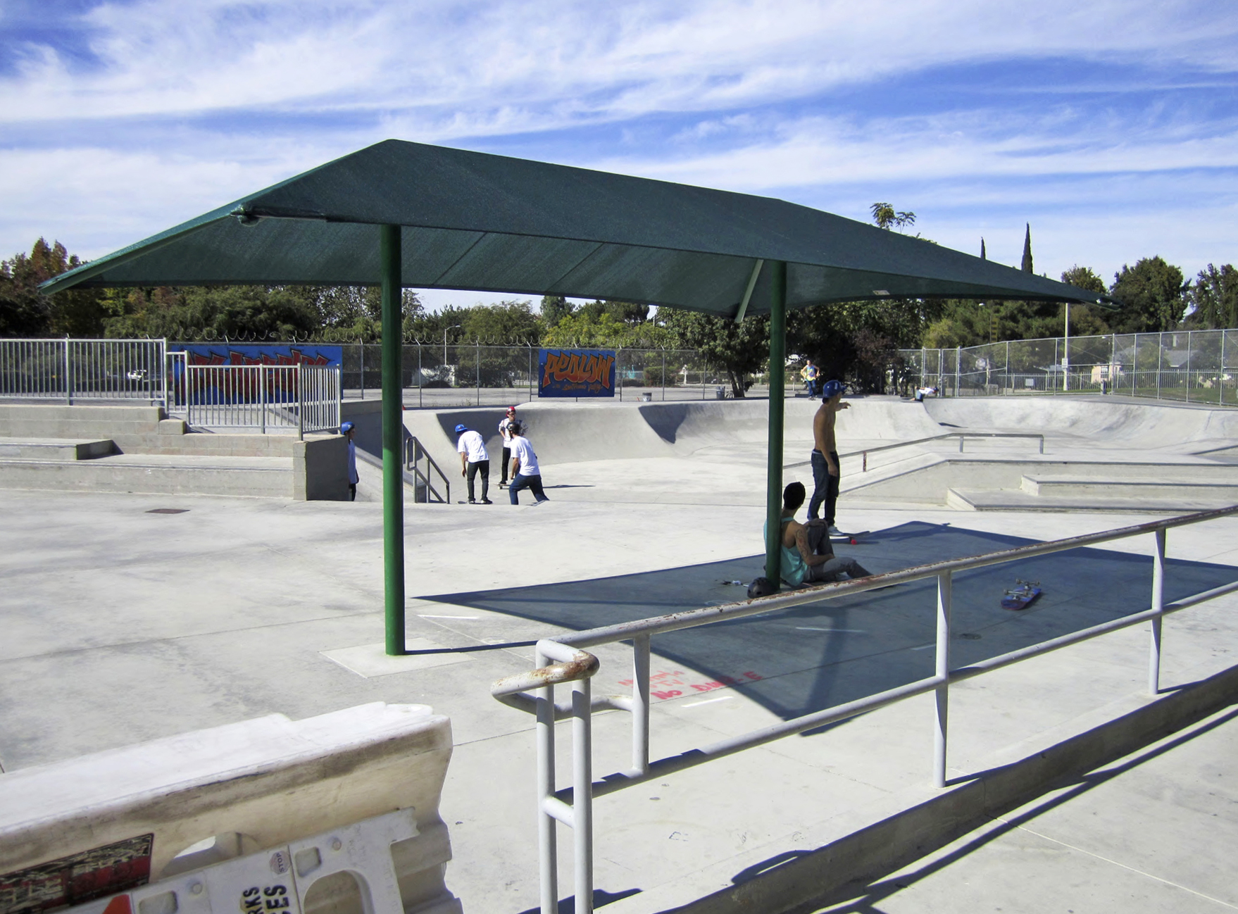 people skateboarding outside in park