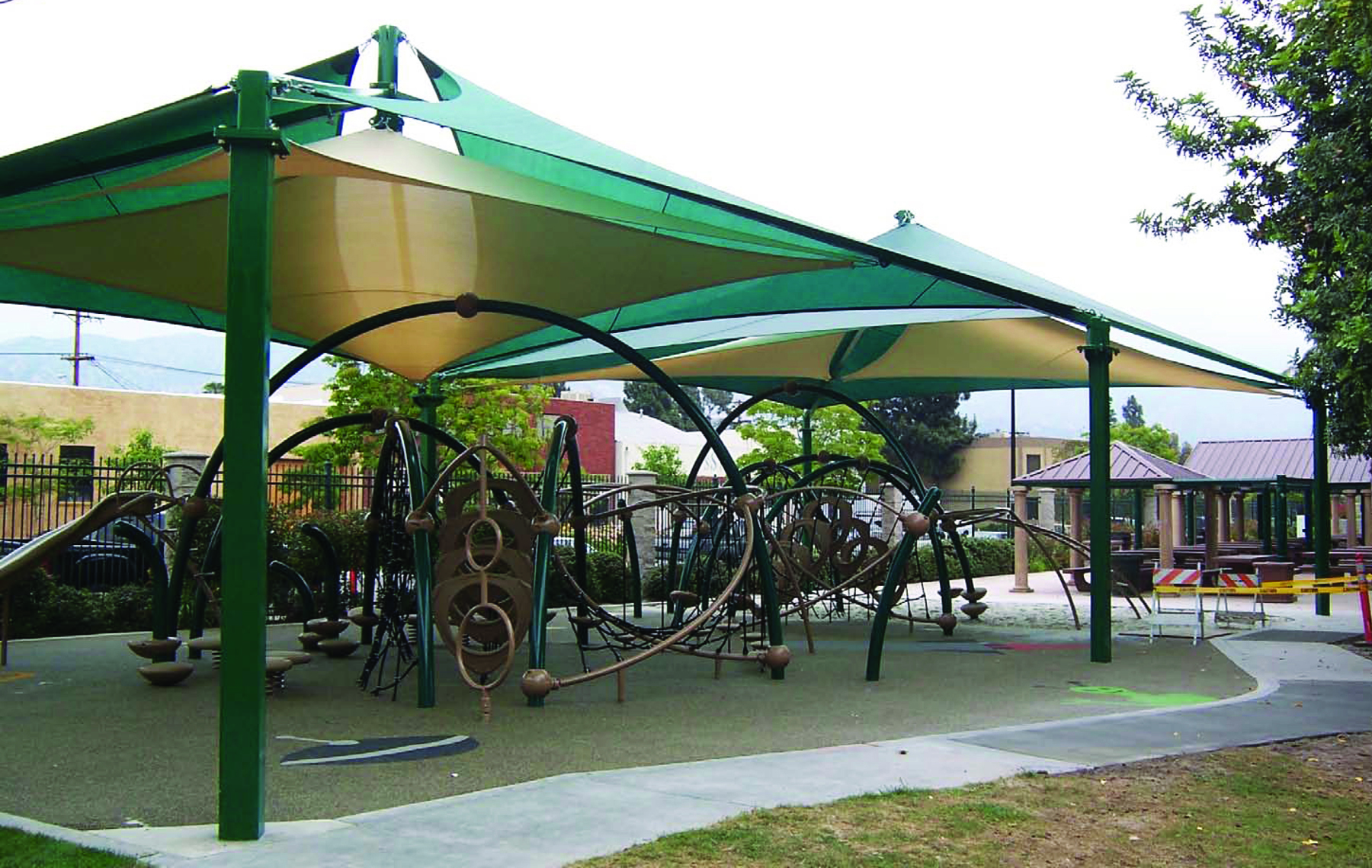 playground equipment covered by multiple usa shades