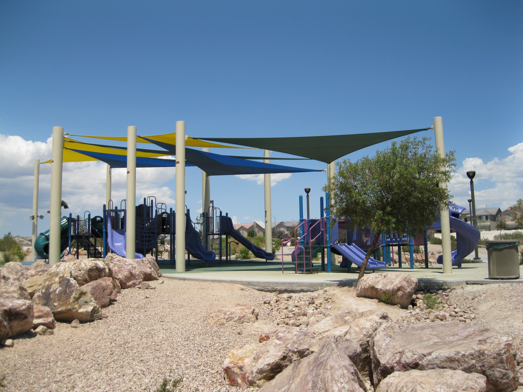 colorful triangle shades covering outdoor playground