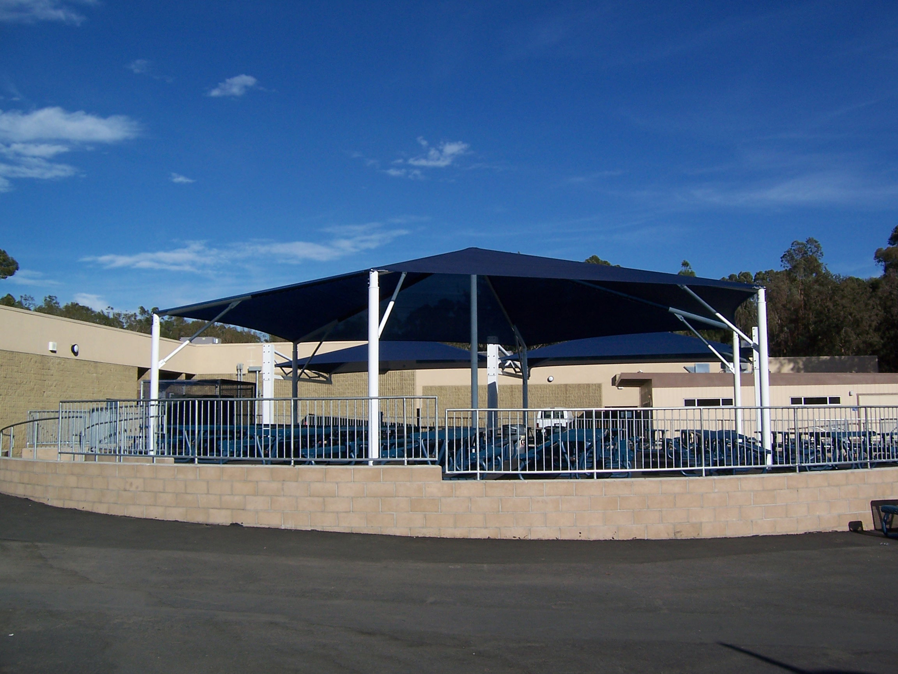 outdoor seating covered by usa shade