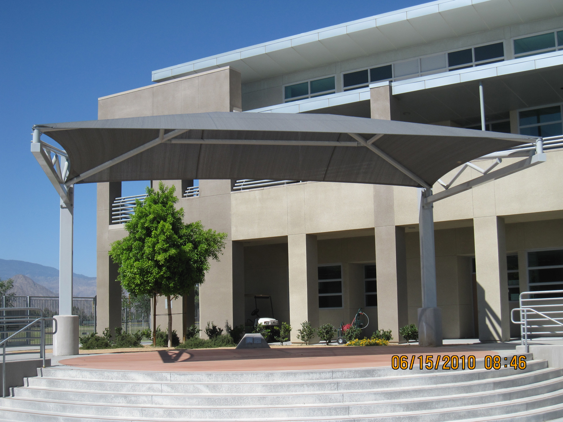 rectangle usa shade covering patio outside high school