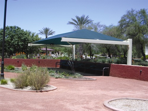 outdoor bench covered by sun shade