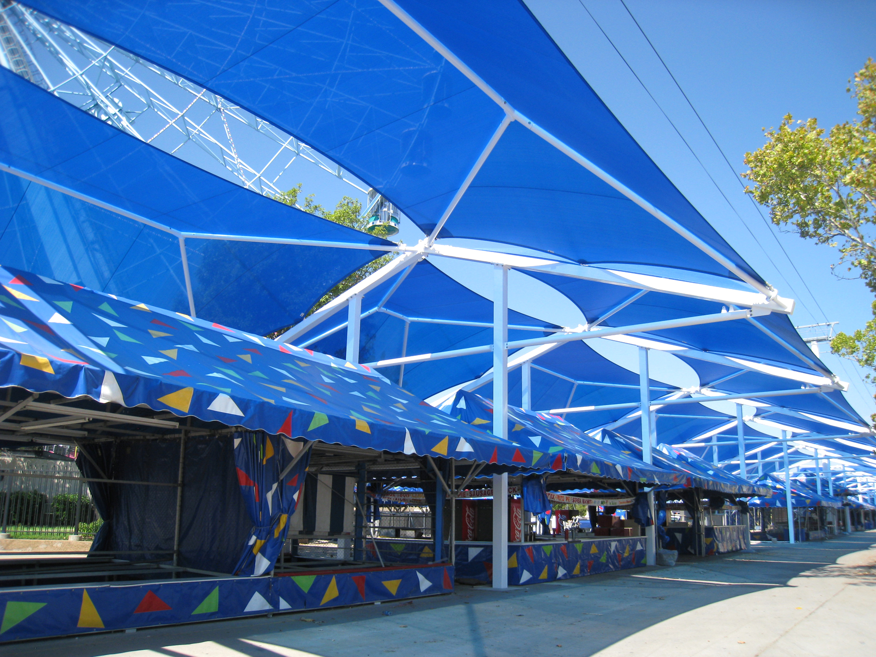 multiple blue usa shades covering carnival tents