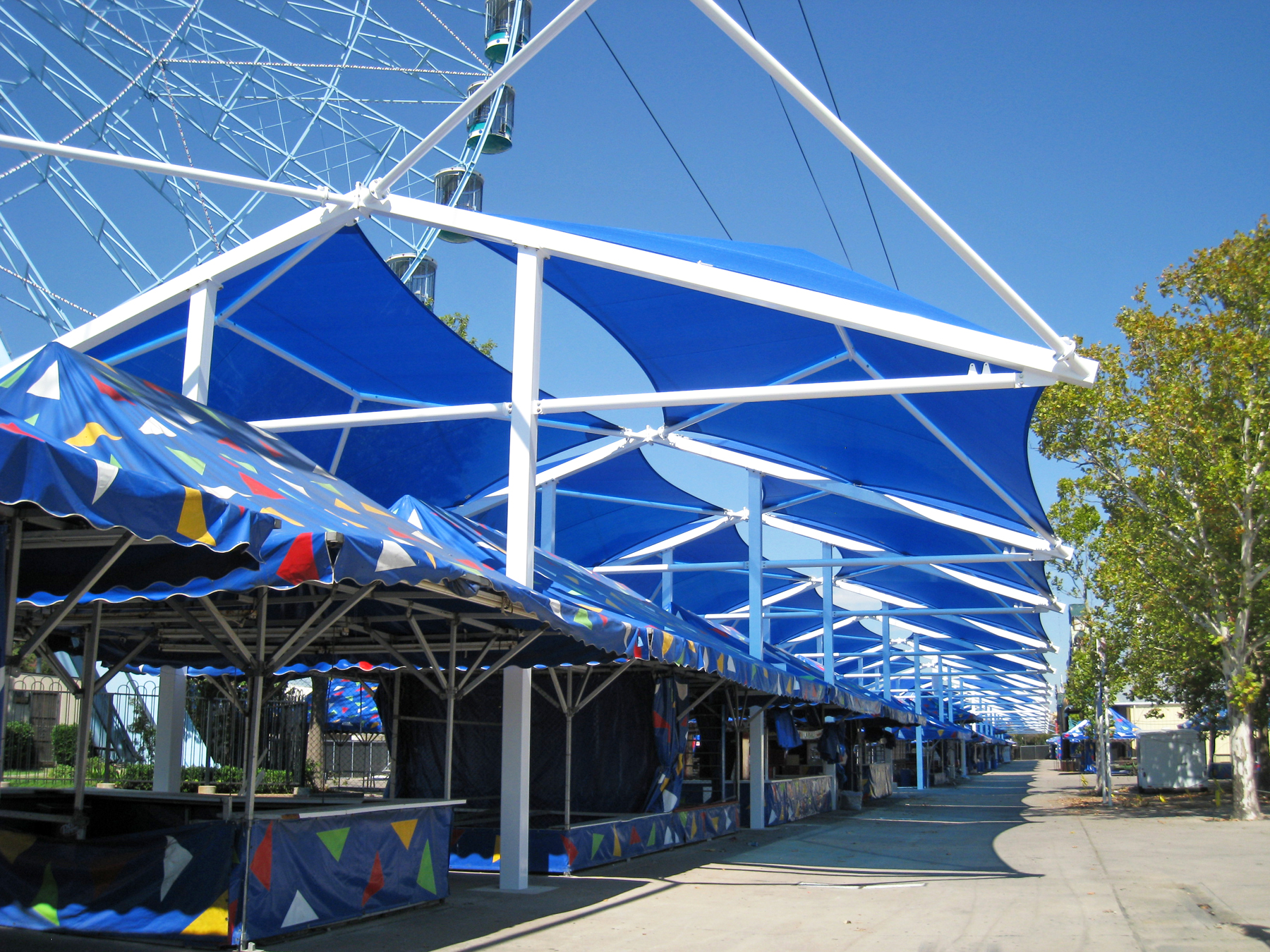 carnival booths set up under usa shades