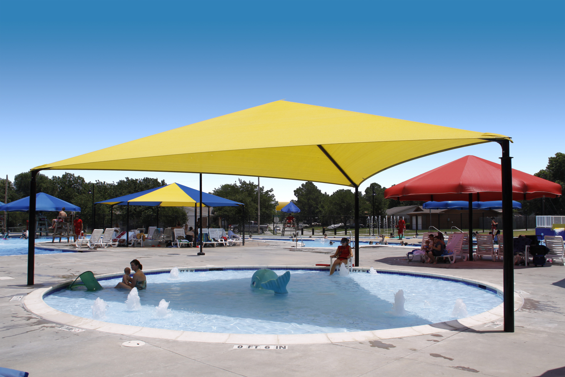 triangle sun shade covering outdoor children's pool