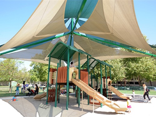 green playground underneath usa shade