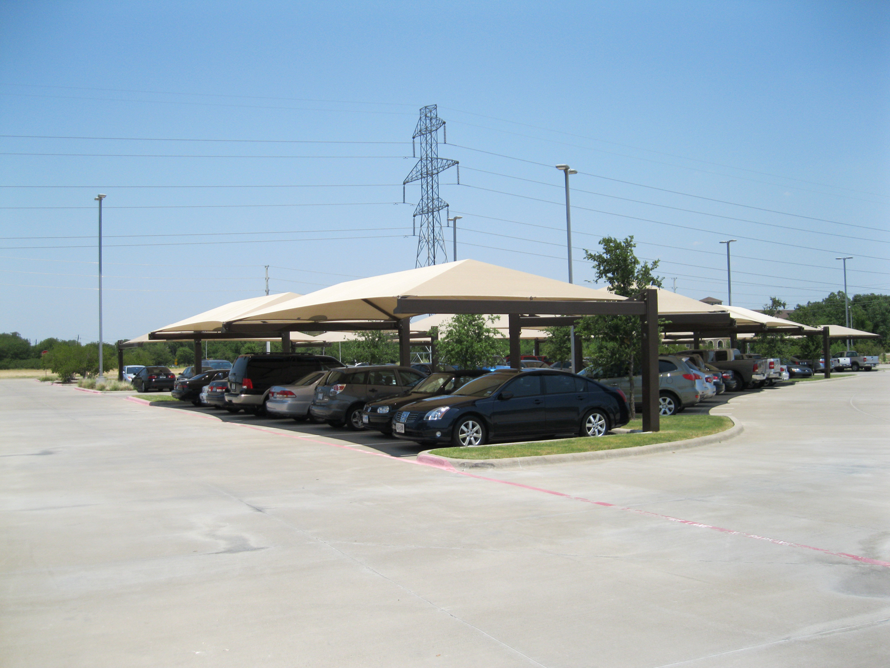 outdoor parking lot covered by usa shades