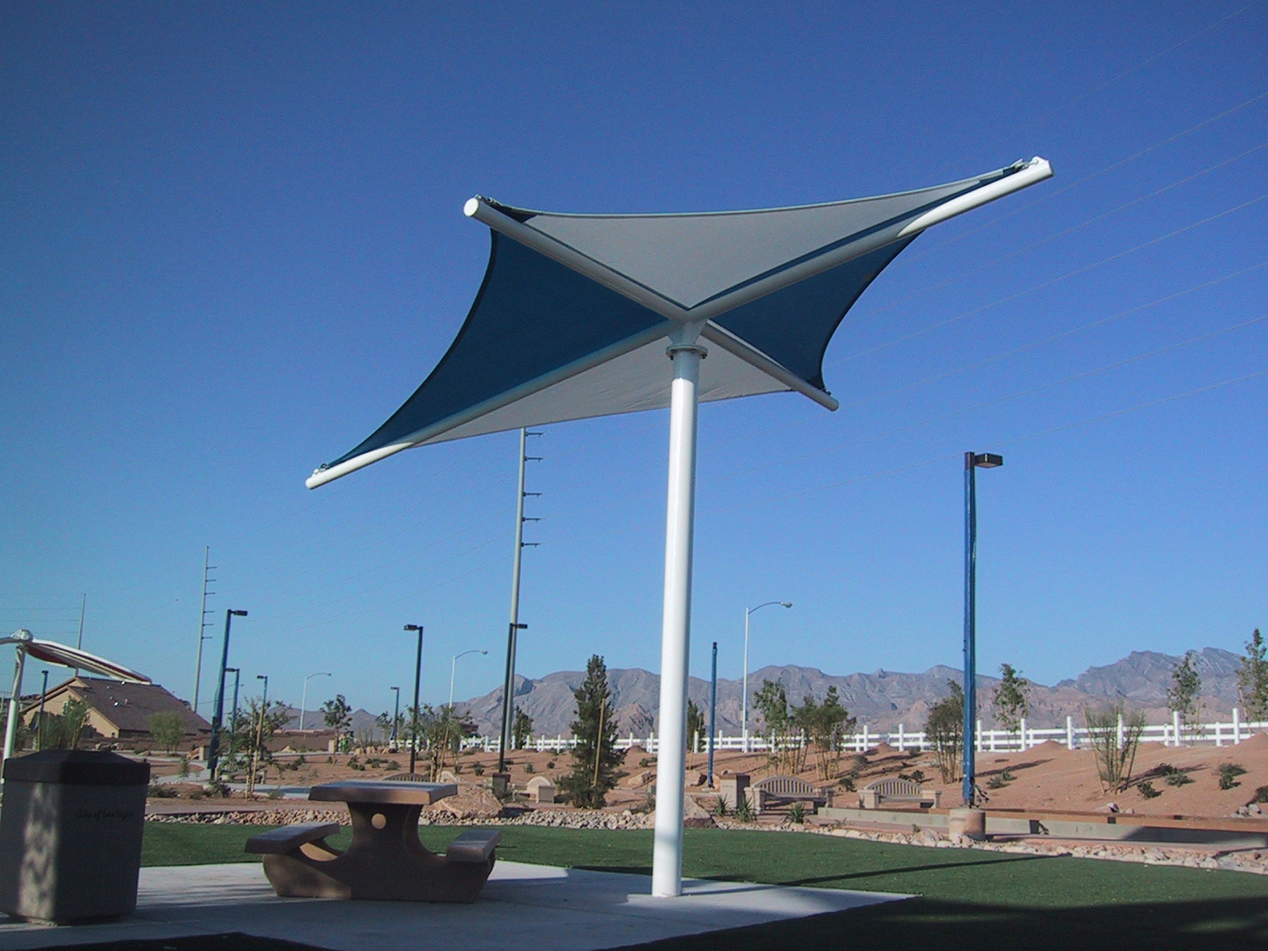 park picnic table shaded by usa shade structure