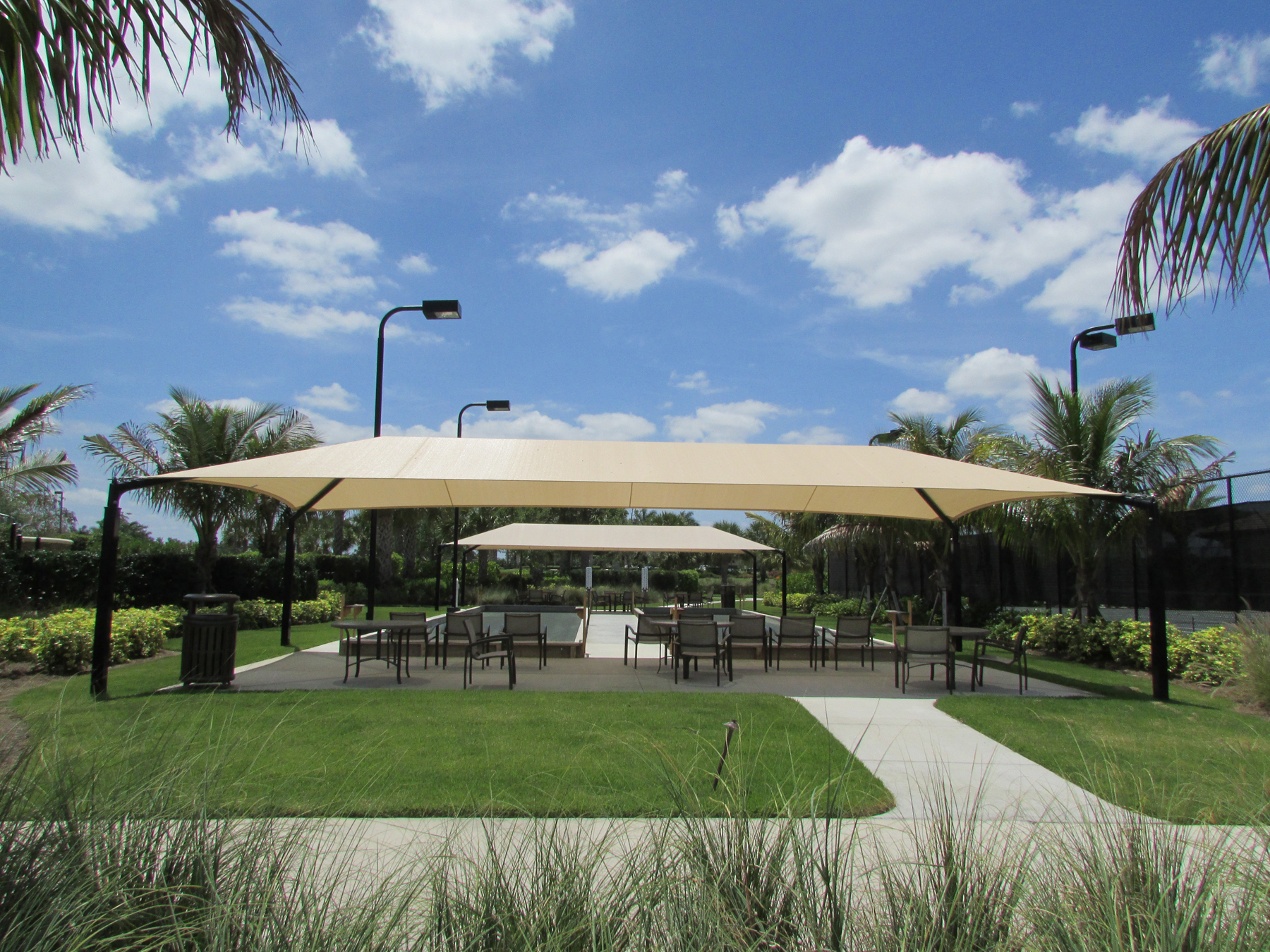 multiple usa shade structures over outdoor seating