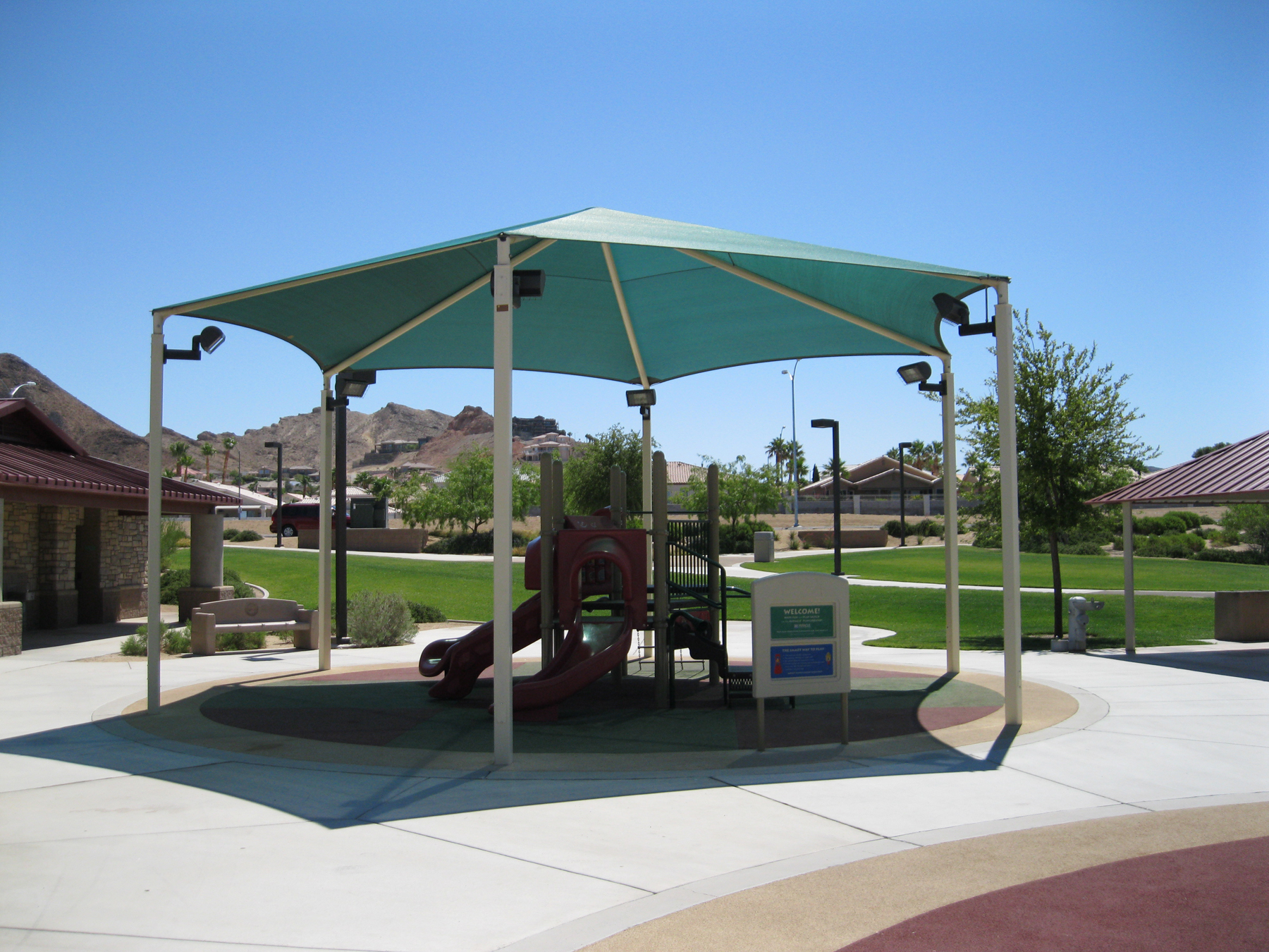 outdoor playground underneath usa shade