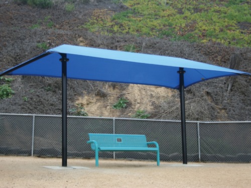 park bench covered by usa shade