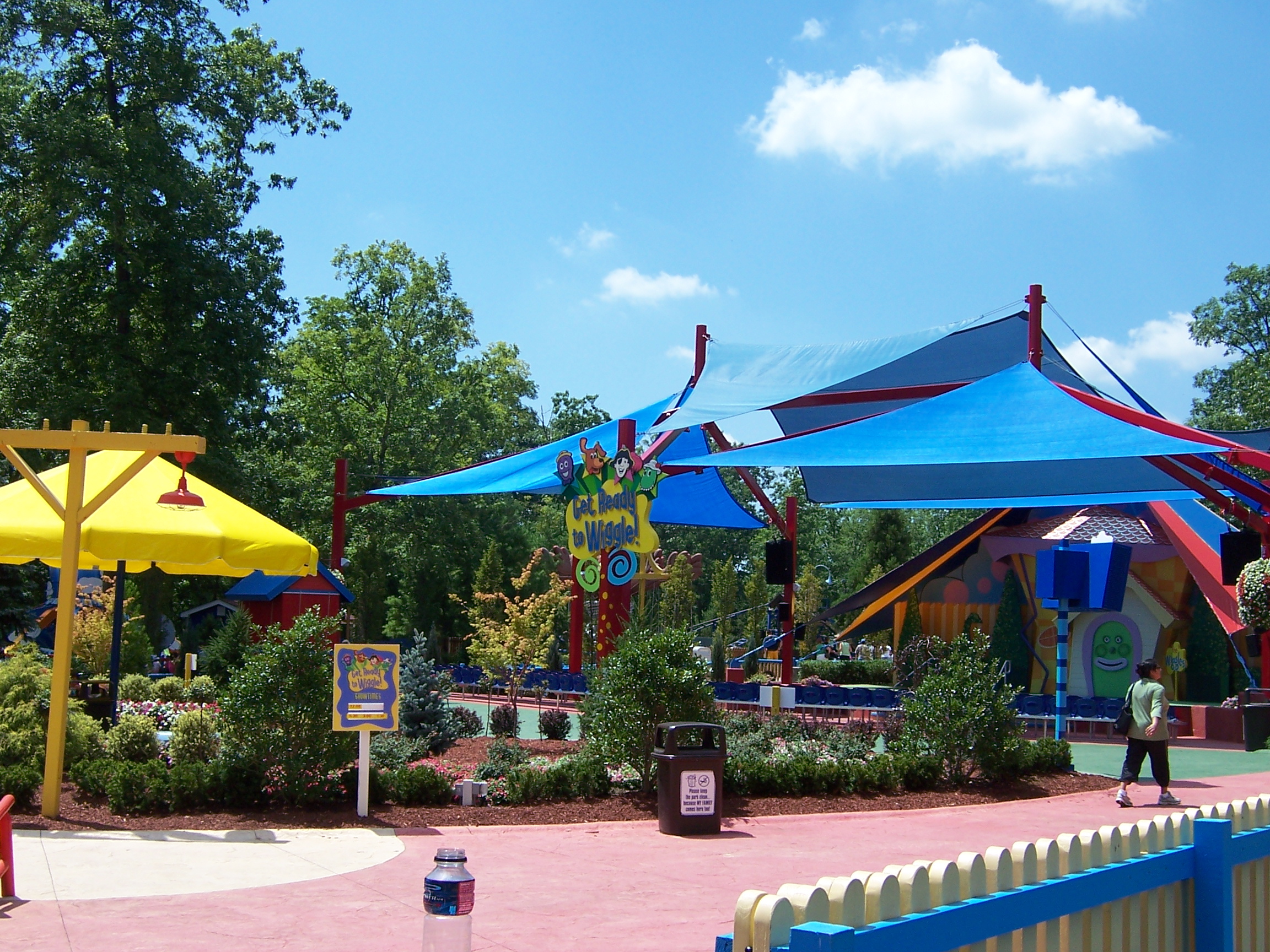 multiple usa shades covering guest seating at amusement park