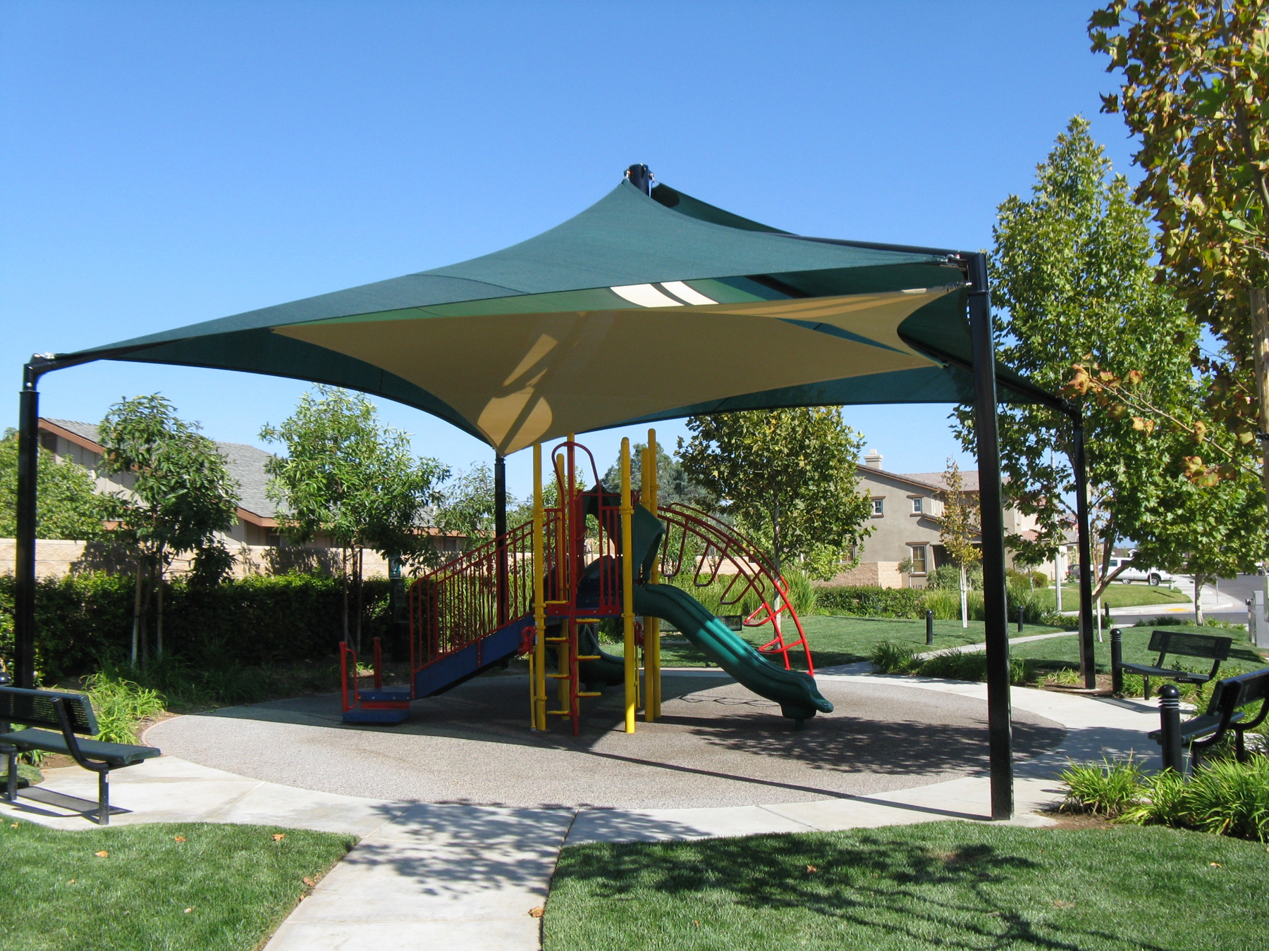 colorful playground under USA shade