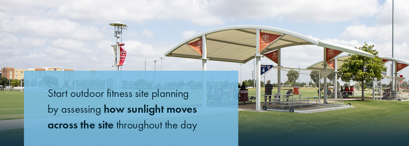 Start outdoor fitness site planning by assessing how sunlight moves across the site throughout the day